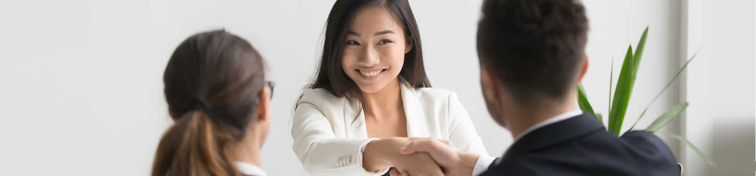 Image of lady shaking hands